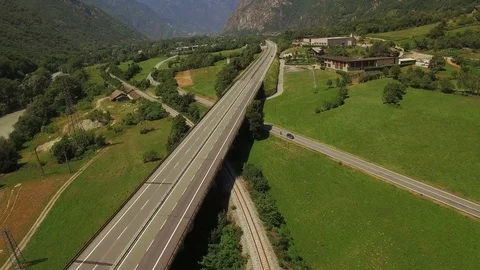 4k aerial top down view of mountainous landscape with local asphalt road  Stock Footage 96238360