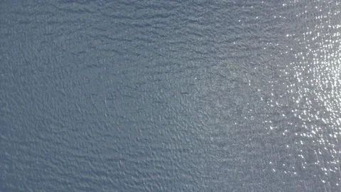 4k Aerial top down view of the blue background of the sea surface in calm Video stock 123842486