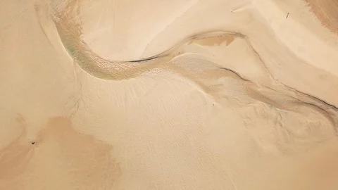 4K Aerial top-down view of sand beach lagoon Stock Footage 127993266