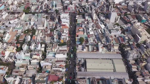4K Aerial Top Down View of overcrowded streets in Ho Chi Minh City Stock Footage 128942650
