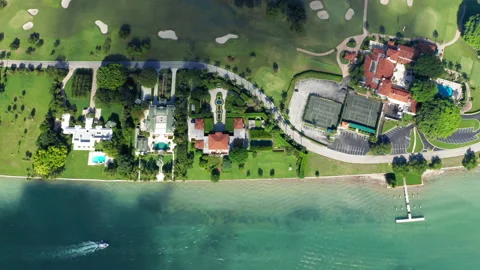 4K aerial top down view of exclusive real estates on private tropical island Stockbeeldmateriaal 134476892