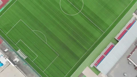 4K aerial top down view over an empty soccer field. Stadium. Green court arena Stock Footage 147358315
