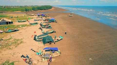 4K Aerial Top-down View of Traditional Fishing Fleet on Nam Dinh Coastline Video stock 326025688