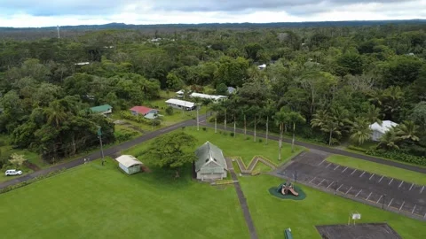 4K aerial top-down view of a basketball court surrounded by the green park area Vídeos de archivo 327698957