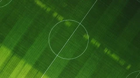 4K Aerial Top Down Zoom Out View Empty Soccer Pitch Green Turf Stadium Stock Footage 334447764