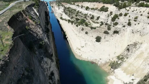 4K Aerial Top View of Corinth Canal Greece - Vertical Cliffs to Horizon Reveal Stock Footage 332160345