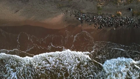 4K aerial top view of the waves of the sea and beautiful sandy Baltic beach,Riga Stock-Footage 229197674