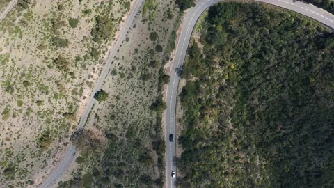 4k Aerial tracking car tracking on a mountain road Stock Footage 205855084