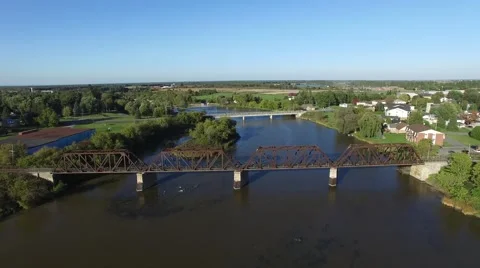 4k aerial train bridge over river and near city Stock Footage 55602922