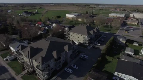 4k aerial two condominiums in small town Stock Footage 63075413