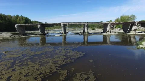 4k aerial under broken train bridge Stock Footage 55607214