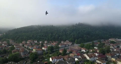 4K Aerial View Above Clouds and Small Village Stock Footage 125203432
