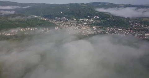4K Aerial View Above The Clouds And Village Stock Footage 125203560