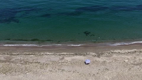 4K Aerial View Advancing Over Sandy Beach Stock Footage 341531586