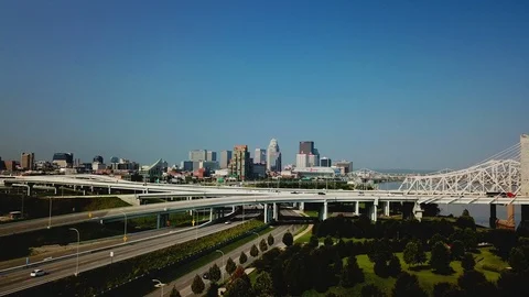 4k aerial view and flyover of bridges outside Louisville with skyline in the dis 스톡 동영상 97808564