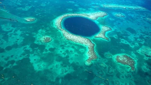 4K Aerial view of the Blue Hole coral reef in Belize Stock Footage