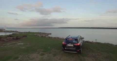 4K Aerial view of car and a sea Stock Footage 67444953