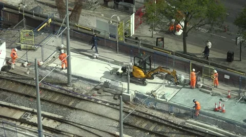 4K Aerial view construction site worker team work tramway railway Manchester day Video stock 60138381