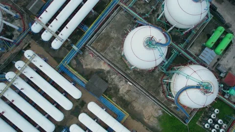 4K : Aerial view from drone flying over a storage tank industry (LNG or LPG) Stock Footage 210774969