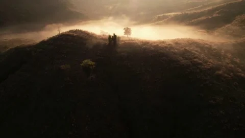 4K Aerial view from drone over mountains and sea of fog. Stock Footage 167939142