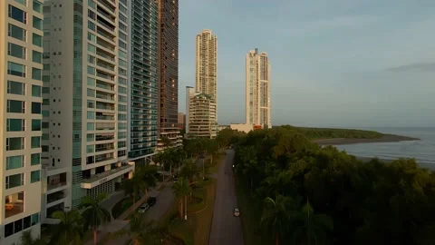 4K aerial view of the eastern coast area. buildings.. bay mangrove sunset Vidéo 167099930