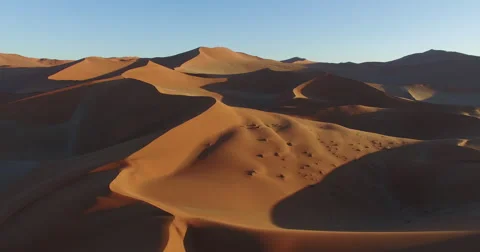 4K aerial view of endless sand dunes of the Namib desert.Namibia Stock Footage 64711109