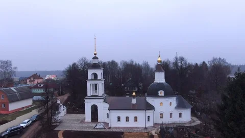 4K aerial view flight between the towers of an ancient church Stock Footage 121753664