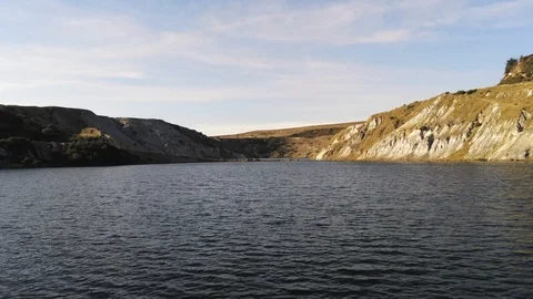 4K Aerial View Flight Over Quarry Lake Water Stock Footage 116037314