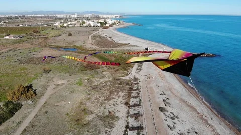 4K Aerial view of flying kite filmed by a drone in mid air .-Close up Stock-Footage 102087783