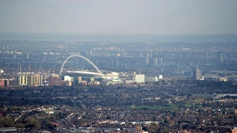 4K Aerial view flying over Wembley stadium &amp; surrounding area - EDITORIAL Stock Footage 77079236
