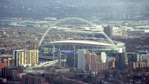 4K Aerial view flying over Wembley stadium &amp; surrounding area - EDITORIAL Video stock 77170571