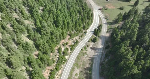 4K Aerial View of a Forest Road in the Mountains of Greece Stock Footage 291898191