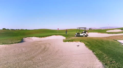4K aerial view forward golf player swing Vídeo Stock 65506253