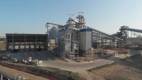 4K Aerial view of grain elevators near the sea port. Grain-drying complex Stock Footage 115330894