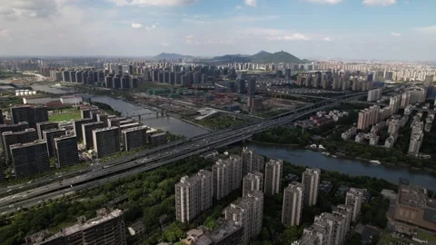 4K Aerial view of Grand Canal business area in Hangzhou city, Zhejiang, China Stock Footage 247136053