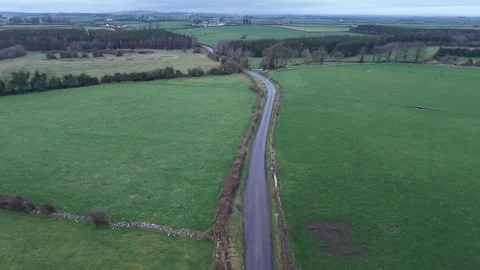 4K Aerial View of Green Fields and Rural Road Stockbeeldmateriaal 333926927