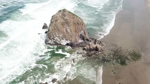 4K Aerial View of Haystack Rock - Cannon Beach, Oregon Stock Footage 135553706