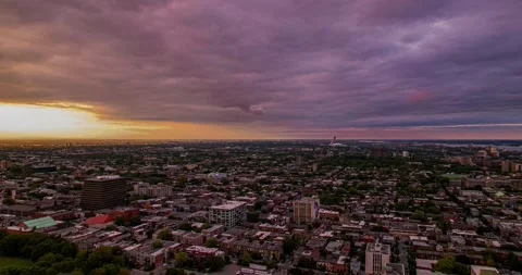 4K Aerial view Hyperlapse of Montreal City at Sunset with colourful clouds Stock Footage 220199011