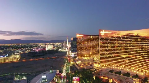 4k aerial view Las Vegas downtown strip forward wynn encore hotel night Stock Footage