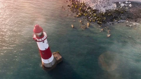 4k - Aerial view of a lighthouse Stock Footage 72076310