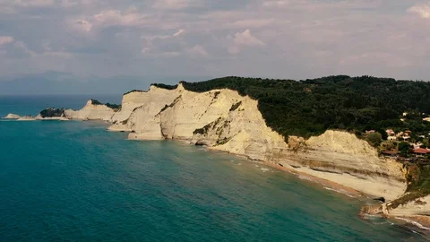 4K aerial view of Logas beach cliffs in Peroulades, Greece Stock Footage 112247648