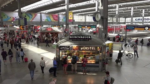 4K Aerial view main train station of Munich busy platform food shop traveler day Stock Footage 70261100