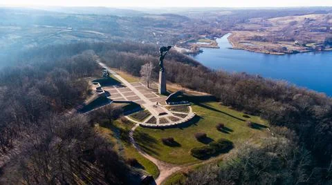 4K Aerial view of a monument in the park on a mountain Stock Photos
