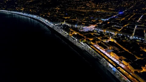 4K Aerial view of Night Nice France promenade, Mediterranean Sea and airport Stock Footage 108601153