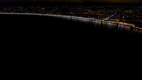 4K Aerial view of Night Nice France promenade, Mediterranean Sea and airport Stock Footage 108601317