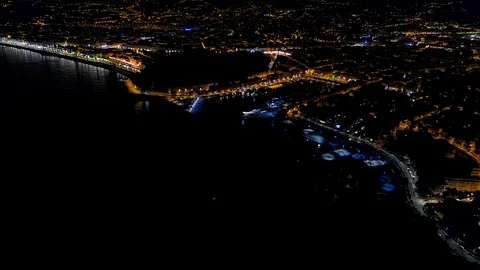 4K Aerial view of Night Nice France promenade, Mediterranean Sea and airport Stock Footage 108601534