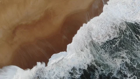 4K Aerial view of ocean waves on the sand beach Stock Footage 107659260