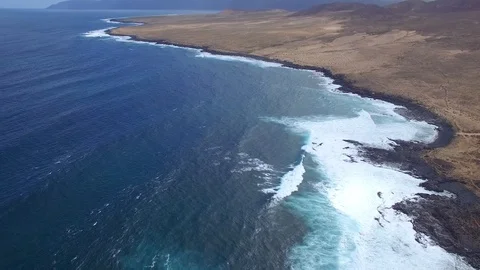 4K Aerial view of ocean waves on coastline of Canary Island - Lanzarote Video stock 123469422
