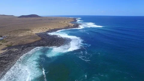 4K Aerial view of ocean waves on coastline, Lanzarote, near Famara Village Stock Footage 123470029