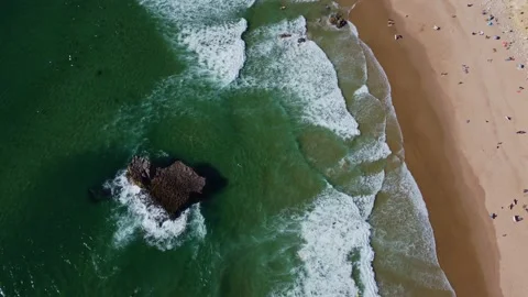 4K aerial view ocean waves rocky cliffs sandy coast, beach Portugal  2023 Stock Footage 239026624